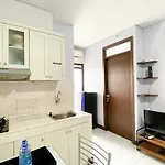Homey And Cozy Living 2Br Lagoon Bekasi Town Square Apartment By Travelio