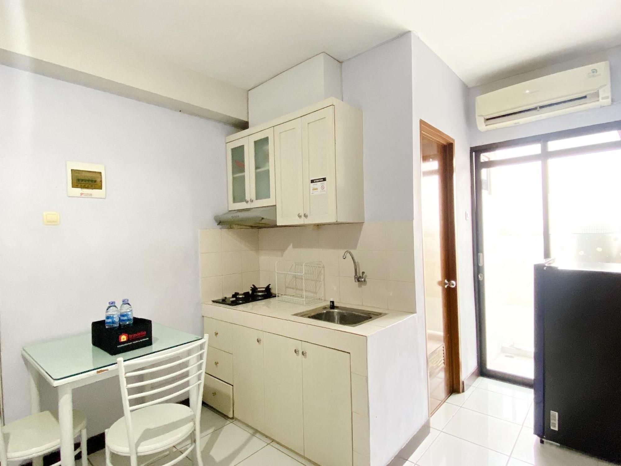 Homey And Cozy Living 2br Lagoon Town Square By Travelio Bekasi
