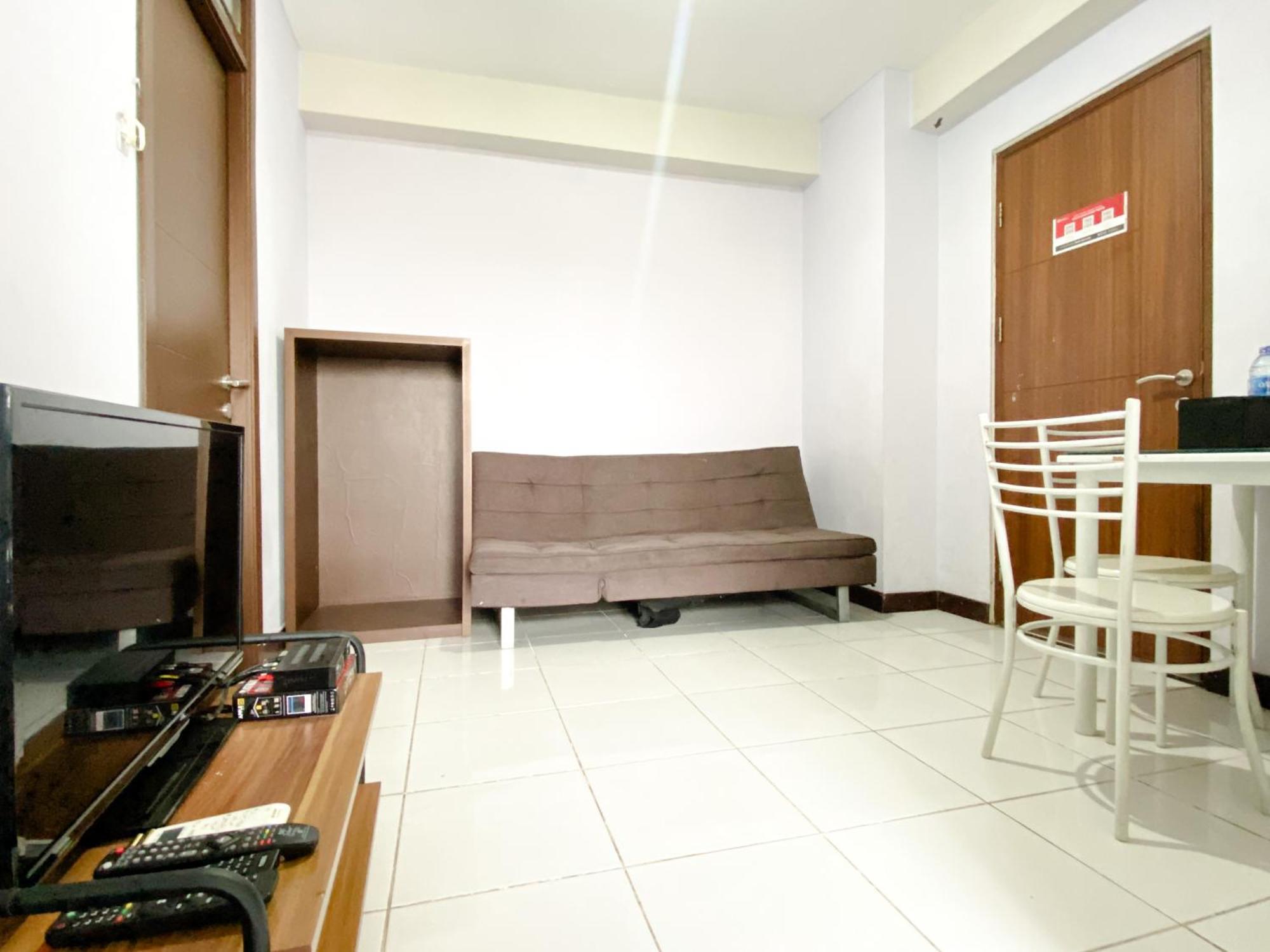 Homey And Cozy Living 2br Lagoon Town Square By Travelio Apartemen