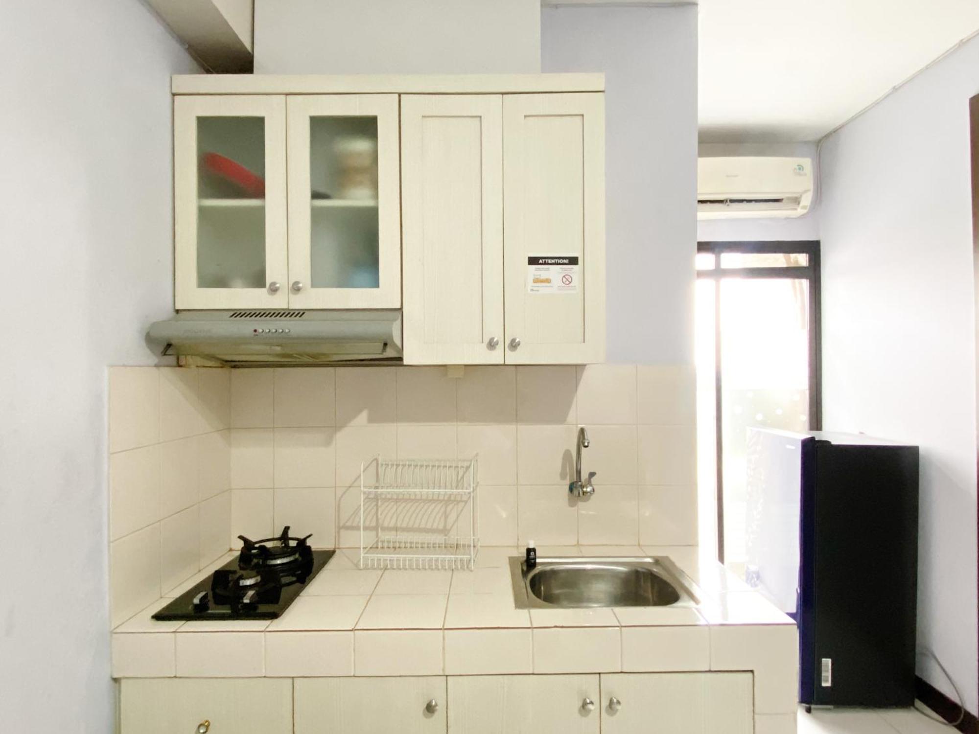 Homey And Cozy Living 2br Lagoon Town Square By Travelio Apartemen *