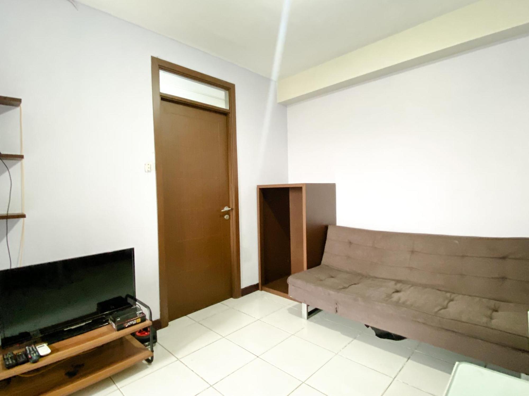 Homey And Cozy Living 2br Lagoon Town Square By Travelio Bekasi