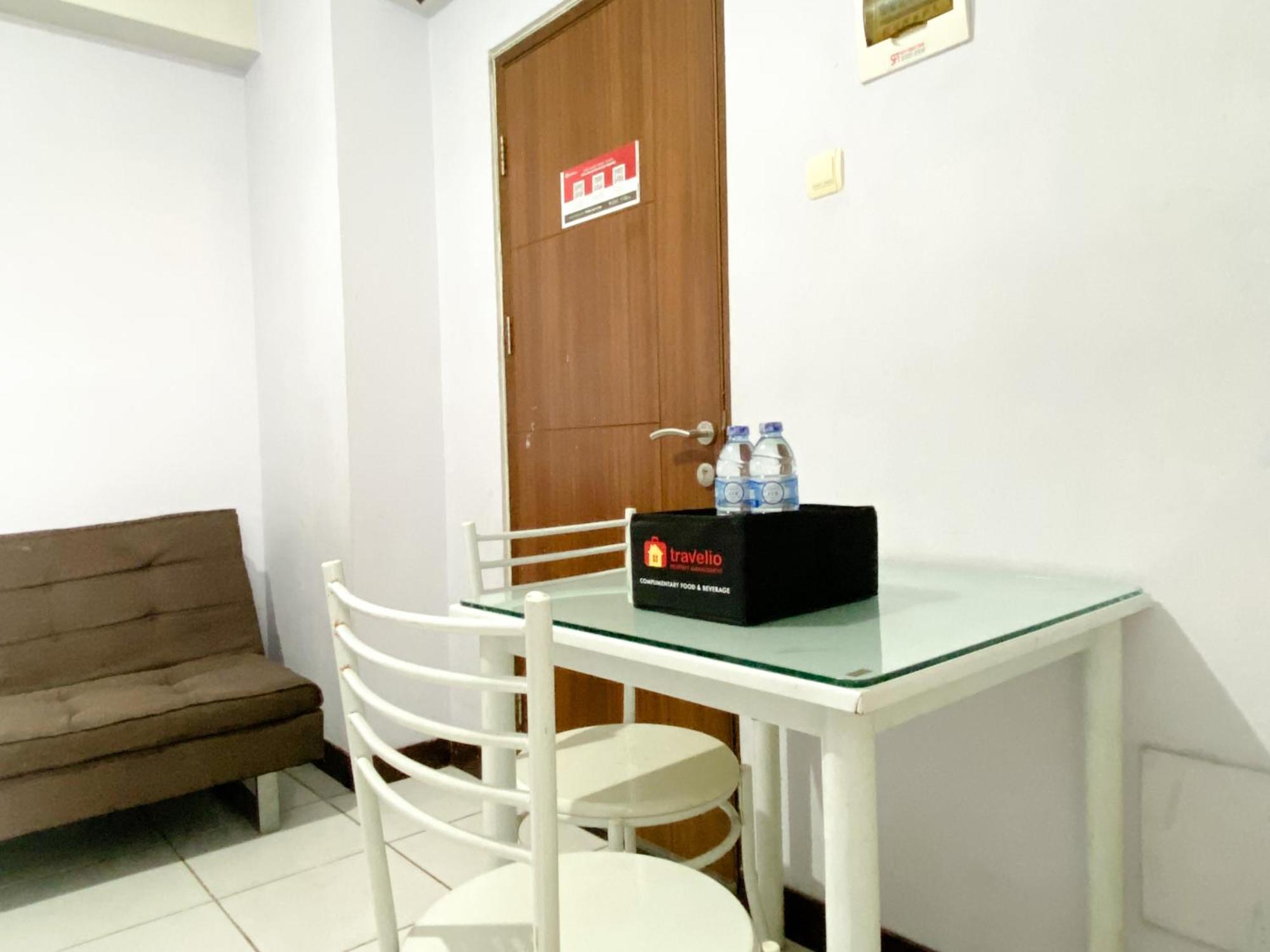 Homey And Cozy Living 2br Lagoon Town Square By Travelio * Bekasi